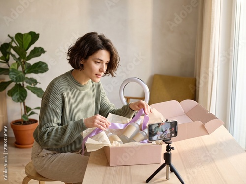Micro Influencer Unboxing PR Package on Smartphone Camera
