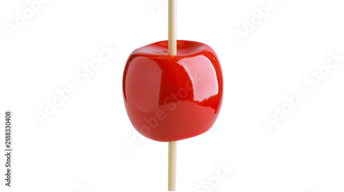 Candy coated red apple on a stick, a sweet treat , perfect for festive designs, isolated on transparent background