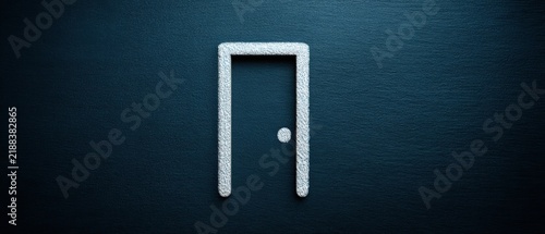 Sleek and simple door design set against a rich textured dark backdrop ideal for contemporary architectural and interior design ideas in visual presentations