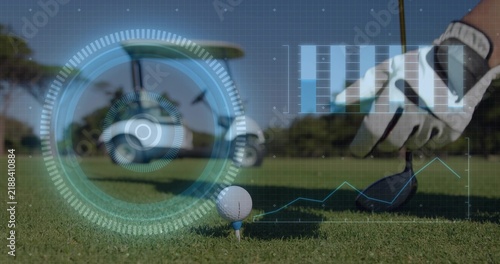 Aligning golf ball on blue tee at tee box, with club head, glove, golf cart, AR