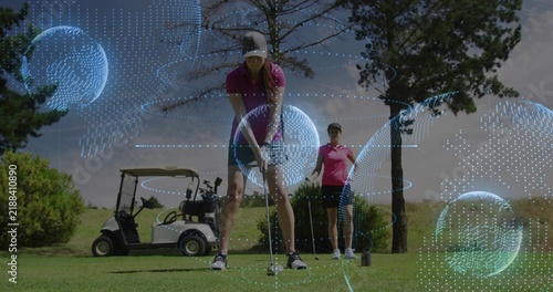 Fotografía Preparing golfer in pink polo and cap, gripping putter over golf ball on green w