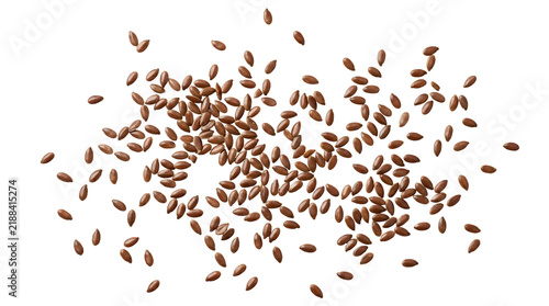 Scattered brown flaxseeds isolated on a transparent background for healthy food design elements
