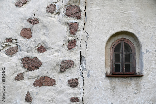 Tapety artystyczne Old wall with a window, for backgrounds or textures