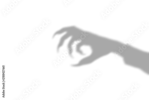 Obraz na płótnie A dark scary shadow of a clawed hand reaching out representing a monster or ghos