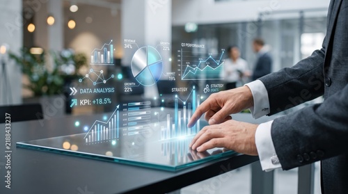Businessman interacting with futuristic holographic data analysis charts and financial graphs on transparent screen, modern office technology concept for growth