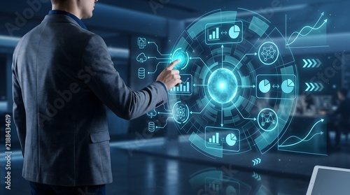 Business professional interacting with a futuristic holographic digital interface in a modern dark office environment