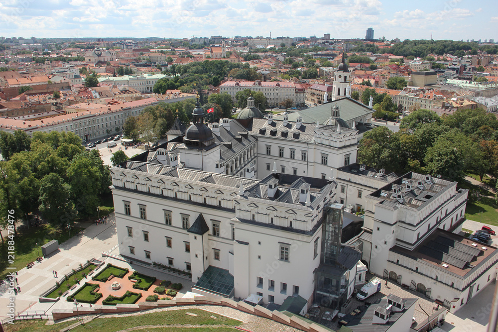 Fototapeta premium Panoramic view of Vilnius Old Town and the Royal Palace from Gediminas Tower window, Lithuania travel concept
