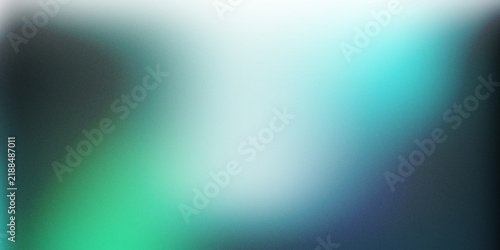 Abstract blurred background with soft gradient transitions in shades of green, teal, and dark blue with grainy texture
