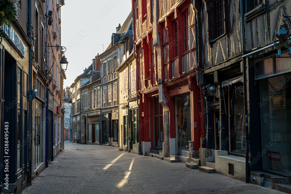 Obraz premium Historic street lined with medieval half-timbered houses in Bourges, France