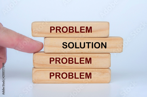 Plakat w ramie Stacked blocks showing solution overcoming multiple problems and challenges.