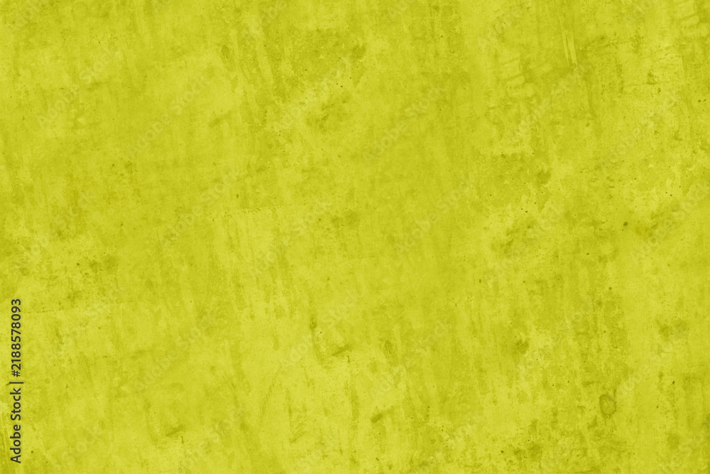 Fototapeta premium Bright yellow green grunge concrete texture background
