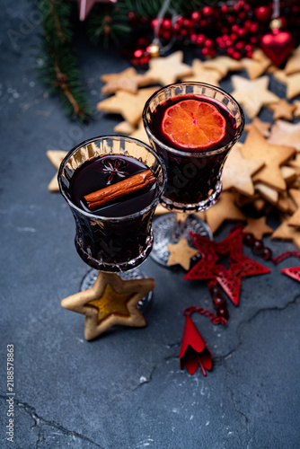 Fotografie Christmas Mulled Wine With Citrus Spices and Evergreen Branches
