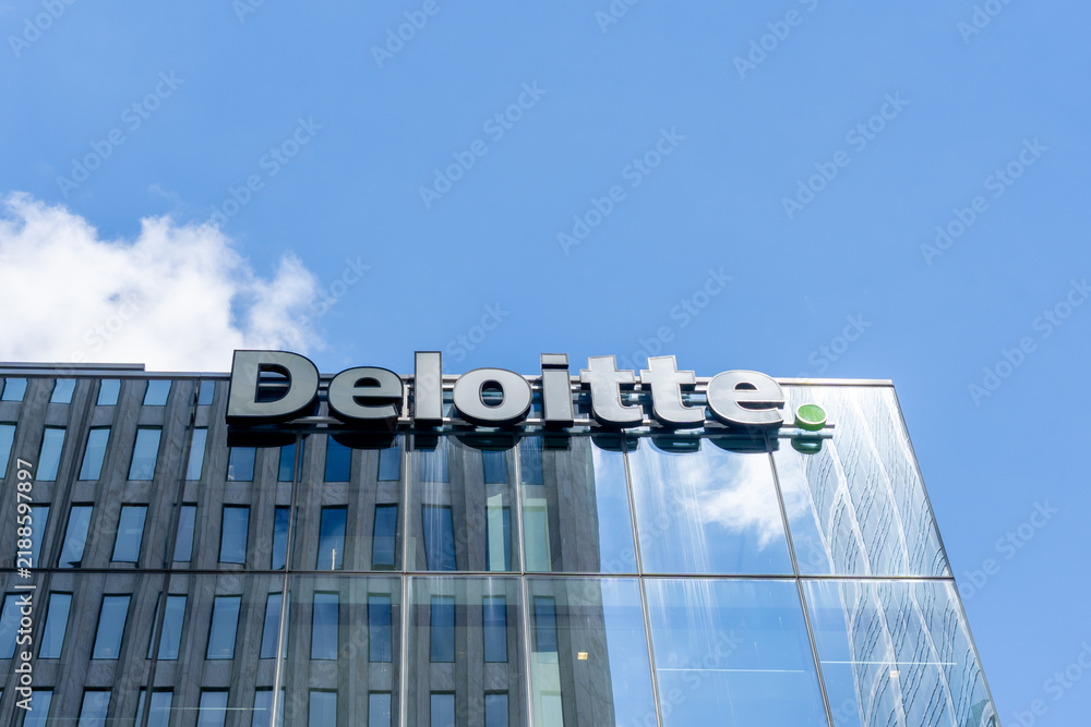 Obraz premium Toronto, Ontario, Canada - September 7, 2026: Closeup of Deloitte sign on the building in Toronto, Ontario, Canada. Deloitte is a British multinational professional services network. 