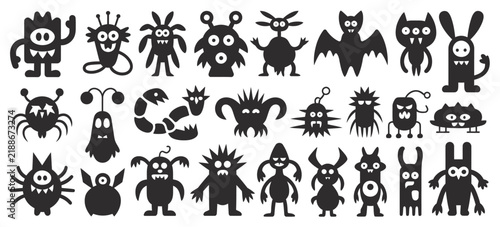 Картината върху платно Large set of black silhouette cute cartoon monsters, aliens, ghosts, and funny c