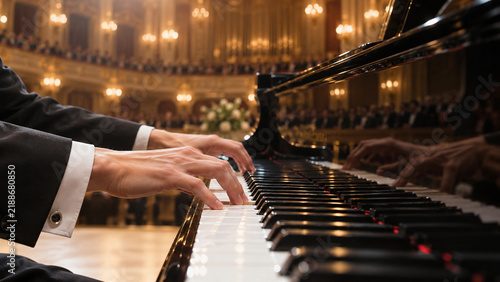 Concert Hall Serenade: A pianist's hands gracefully dance across the keys of a grand piano in a lavish concert hall.