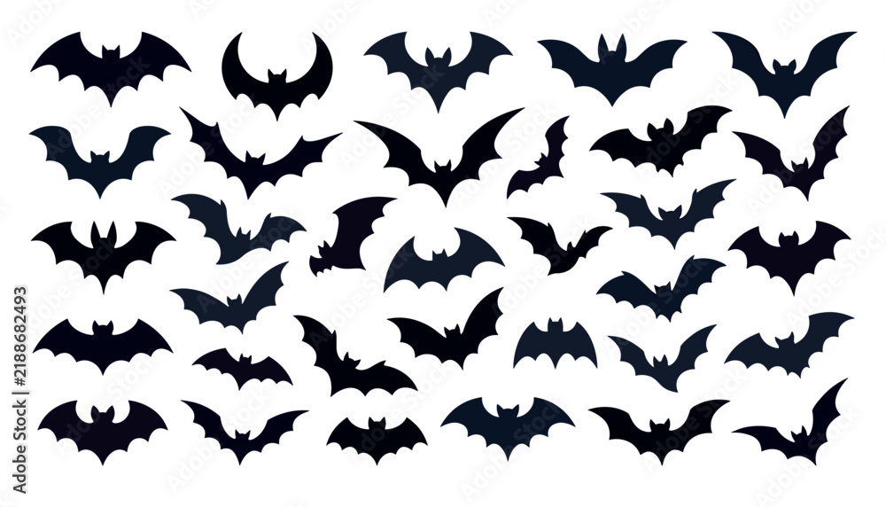 Fototapeta premium Black flying bats vector silhouette set featuring spooky halloween decoration elements collection isolated on white background