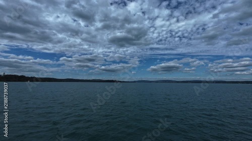 Ferry ride across Lake Constance between Konstanz and Meersburg, Germany, with views of open water, distant shoreline and surrounding landscape on an overcast day.