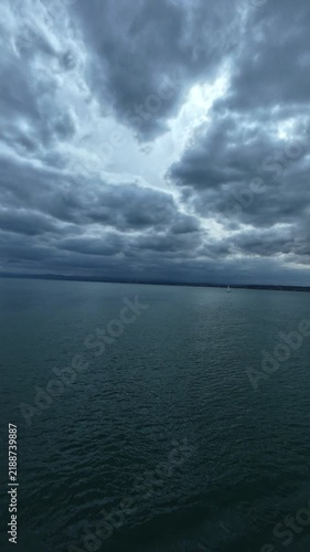 Ferry ride across Lake Constance between Konstanz and Meersburg, Germany, with views of open water, distant shoreline and surrounding landscape on an overcast day.
