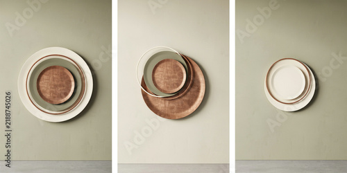 Stacked circular plates in copper and cream tones on a soft green wall background surface