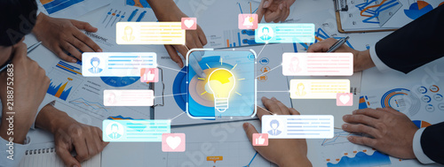 Foto Collaborative Business Meeting with Digital Devices Showing Data Analytics and Communication Graphics