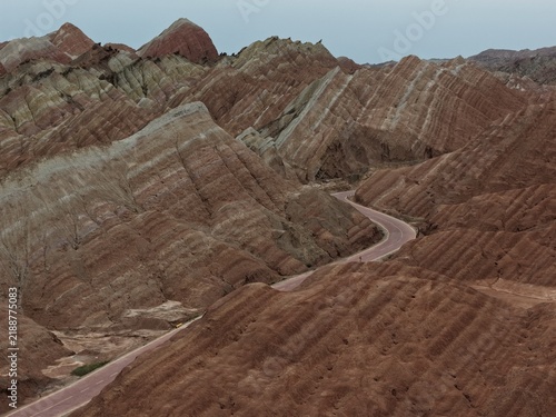 Canvas Print Colorful Zhangye Danxia mountains in Gansu, China, featuring layered rainbow rock formations, dramatic desert scenery and striking geology in a famous Danxia geopark