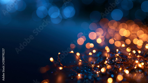 Fairy Lights with Golden Bokeh on Blue Background