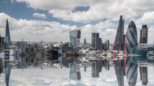 london skyline perfectly reflected in water