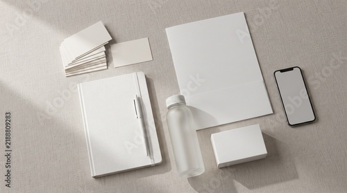 Blank stationery branding mockup set on a neutral fabric background