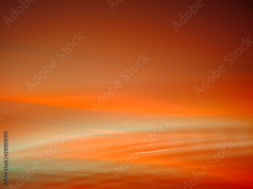 Bild auf Leinwand Abstract intentional camera movement (ICM) photography featuring warm orange and amber gradient streaks with subtle light trails