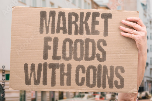 Foto "Market floods with coins" Oversupply of new cryptocurrencies diluting investor attention and value