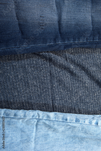 Bild auf Leinwand Background featuring two types of denim and fabric