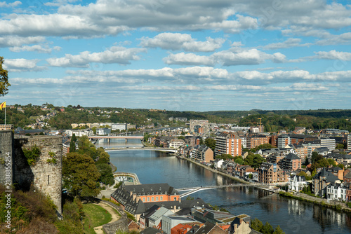 Canvastavla Sunlit river winds through historic town namur belgium
