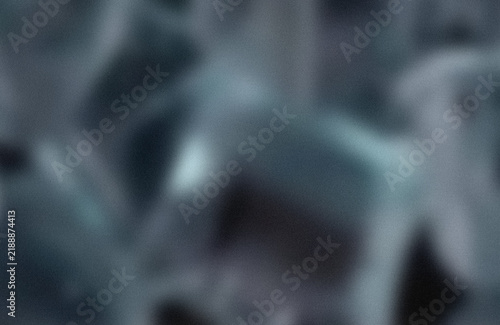 Obraz na plátně Blurred abstract light spot on dark background