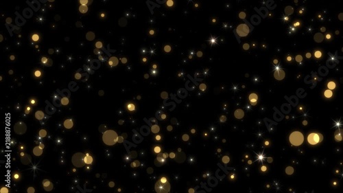 Bright golden flying sparks of particles. Glowing twinkle fairy glitter particles. Holiday Christmas bokeh background. Embedded alpha channel. ProRes 4444