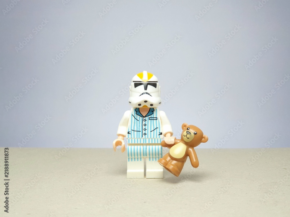 Fototapeta premium Indonesia - November 24, 2023 : Mini toy figure of lego at table with blurred background. Miniature photography concept design.
