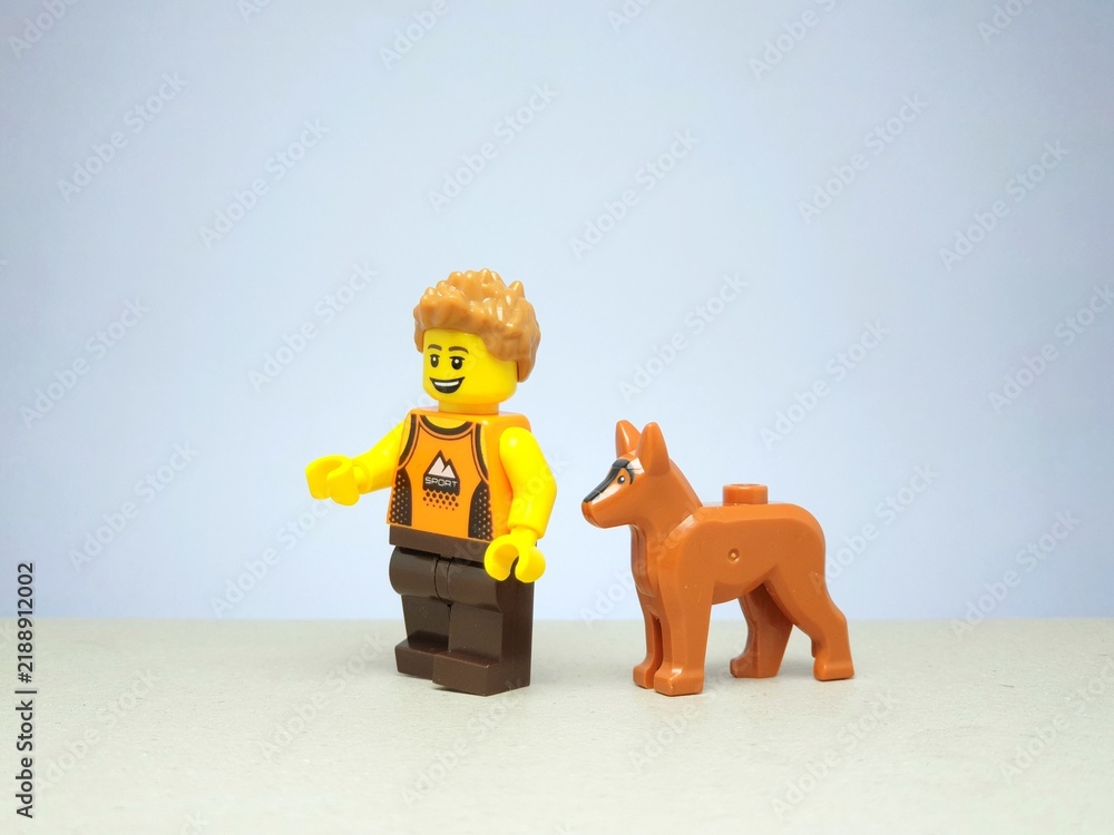Fototapeta premium Indonesia - November 24, 2023 : Mini toy figure of lego at table with blurred background. Toy photography concept design.