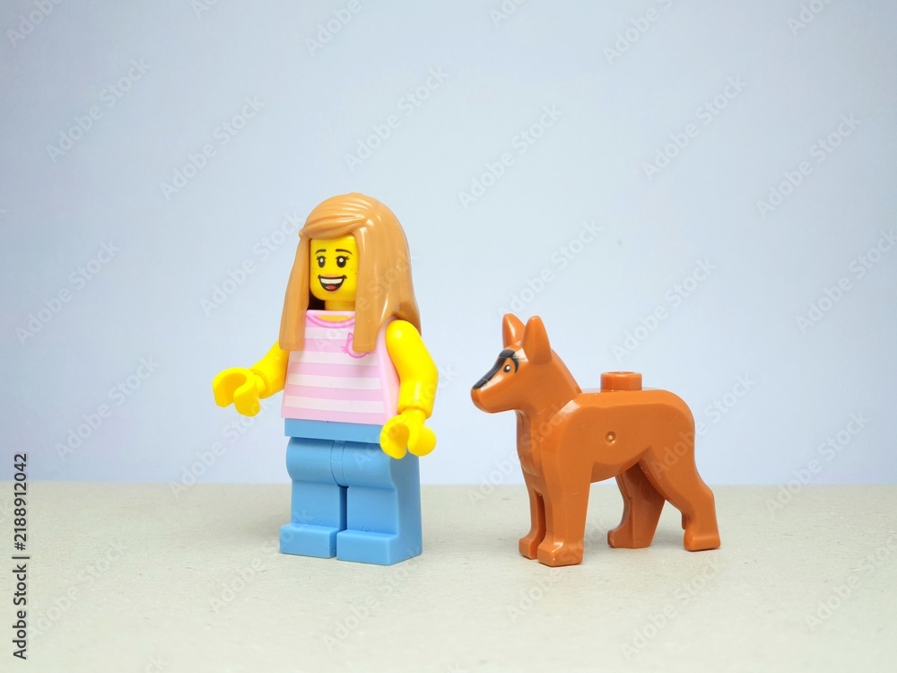 Fototapeta premium Indonesia - November 24, 2023 : Mini toy figure of lego at table with blurred background. Toy photography concept design.