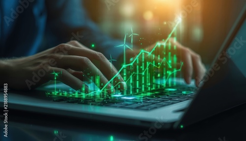 Hands typing on laptop with virtual green financial stock market growth candlestick charts and data visualization candlestick chart trading analytics investment growth market analysis