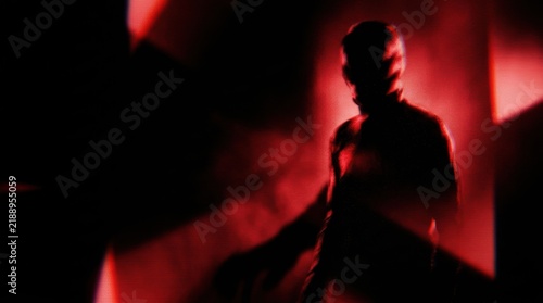 Retro Psychological Horror Banner with Distorted Silhouette and Red Lighting