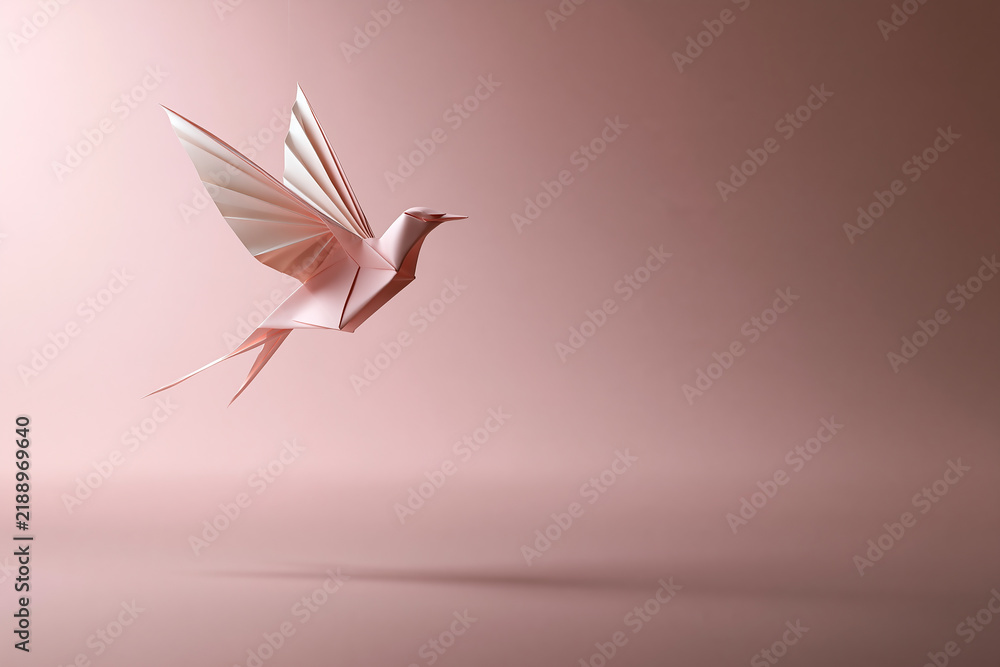 Fototapeta premium Flying Pink Paper Origami Hummingbird Isolated on Soft Background