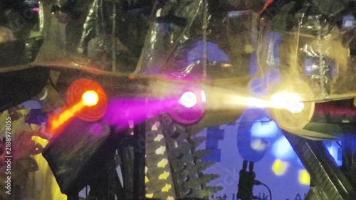 Abstract light installation with colorful glowing orbs and beams creating a futuristic digital atmosphere