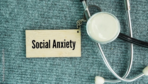 Obraz na plátně Stethoscope and paper tag with the word Social anxiety