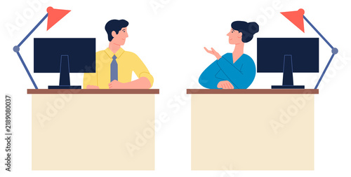 Colleagues talking at workplace. Office worker computer desks