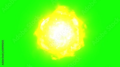 Fireball of glowing yellow energy burns brightly in the center against a vivid chroma key green screen background.