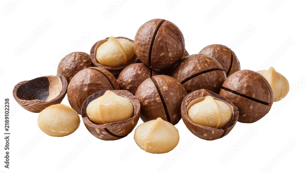 Fototapeta premium Pile of whole and cracked macadamia nuts with creamy kernels, isolated on transparent background