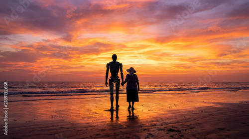 Humanoid robot walking with a child along a beach at sunset, dramatic orange sky and ocean reflections, representing artificial intelligence, companionship, future technology and human robot 