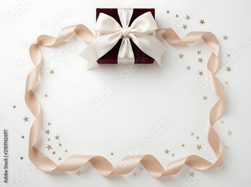 Elegant gift box with white ribbon and decorative frame