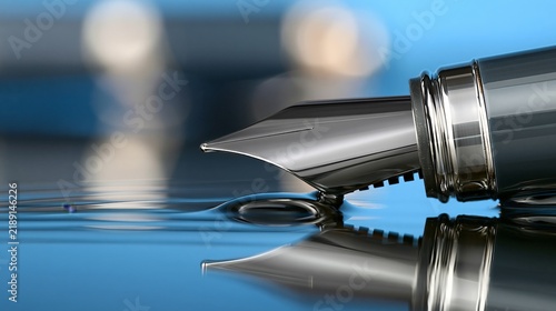 Close-up of a fountain pen reflecting in water, highlighting craftsmanship and elegance.