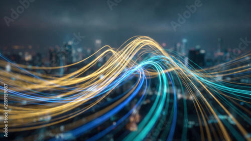 Abstract light trails weave through a modern night cityscape showing digital connectivity.