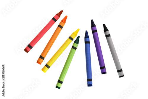 Group of wax crayons standing upright on a white background with art supplies colored crayons drawing tools school supplies writing instruments kids crafts
